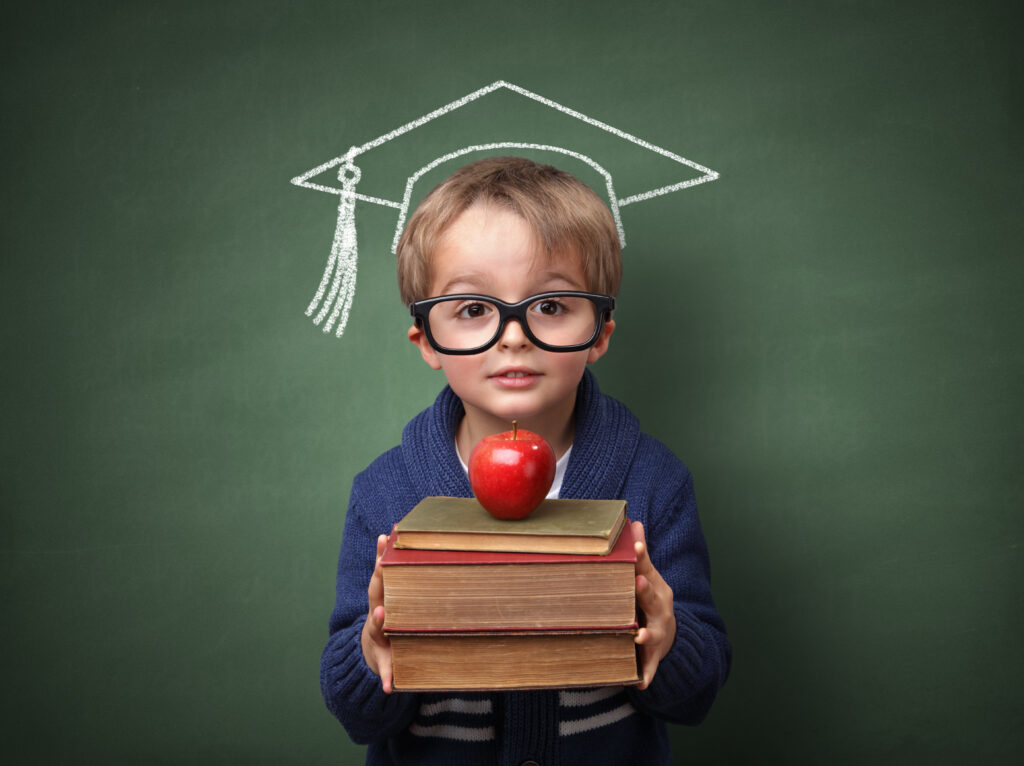 Boy holding books